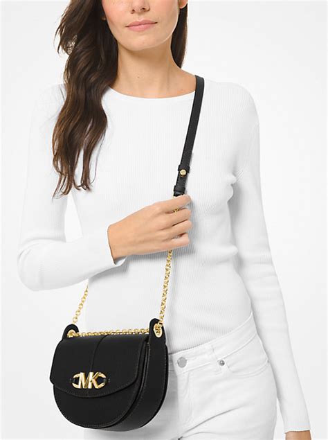 michael kors izzy crossbody|Izzy Small Pebbled Leather Saddle Crossbody Bag .